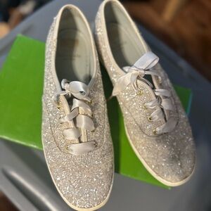 Woman’s Kate Spade white sparkley keds. size 10.